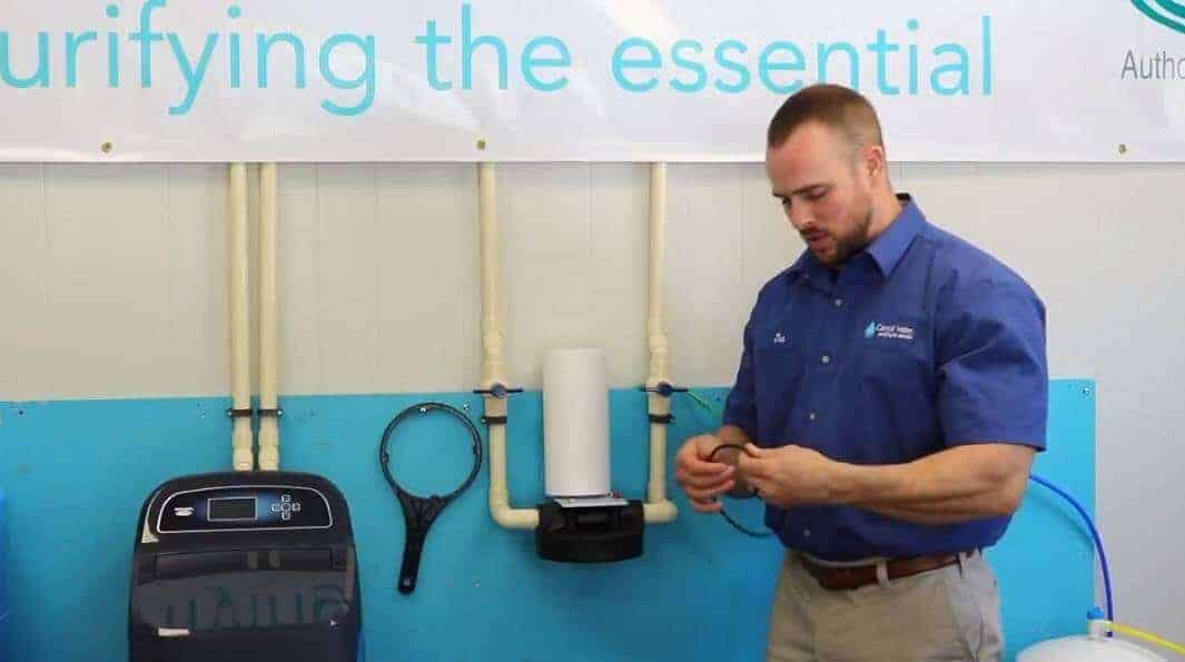 Pictured: Joe Fiorani showing how to change a water filter. Next, examine the o-ring for problems.