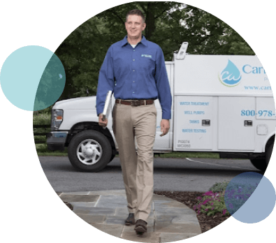 Carroll Water Expert walking up to customer home for a residential water treatment consultation