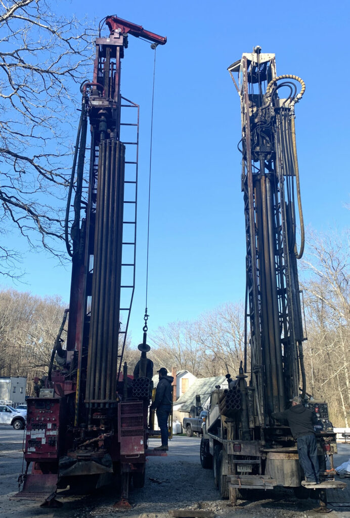 mud drilling rig and rock drilling rig parked next to each other in rural Virginia
