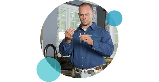 Carroll Water technician performing a water test